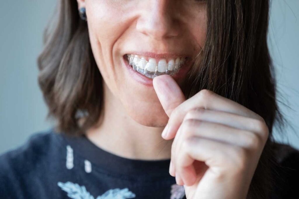 woman wearing invisalign Creekside Dental